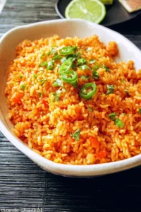 Bowl of easy Mexican rice garnished with cilantro