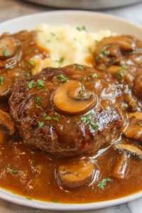 Easy Salisbury steak with mushroom gravy served on a plate