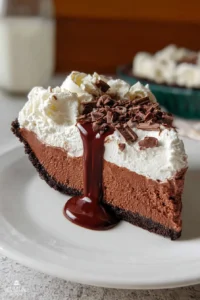 Sky high chocolate mousse pie with a rich and creamy texture