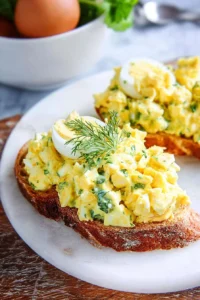 Delicious homemade egg salad served on fresh bread