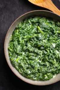 Delicious bowl of creamed spinach served as a side dish