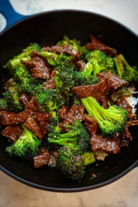 Delicious easy beef and broccoli served in a bowl with rice