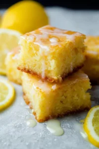 Delicious glazed lemon brownies topped with sweet lemon icing
