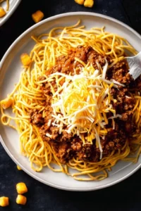Serving of Gold Star Cincinnati Chili with cheese and onions