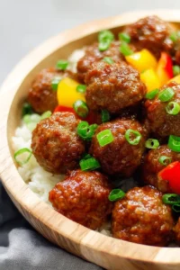 Delicious Hawaiian Meatballs served with pineapple and teriyaki sauce.