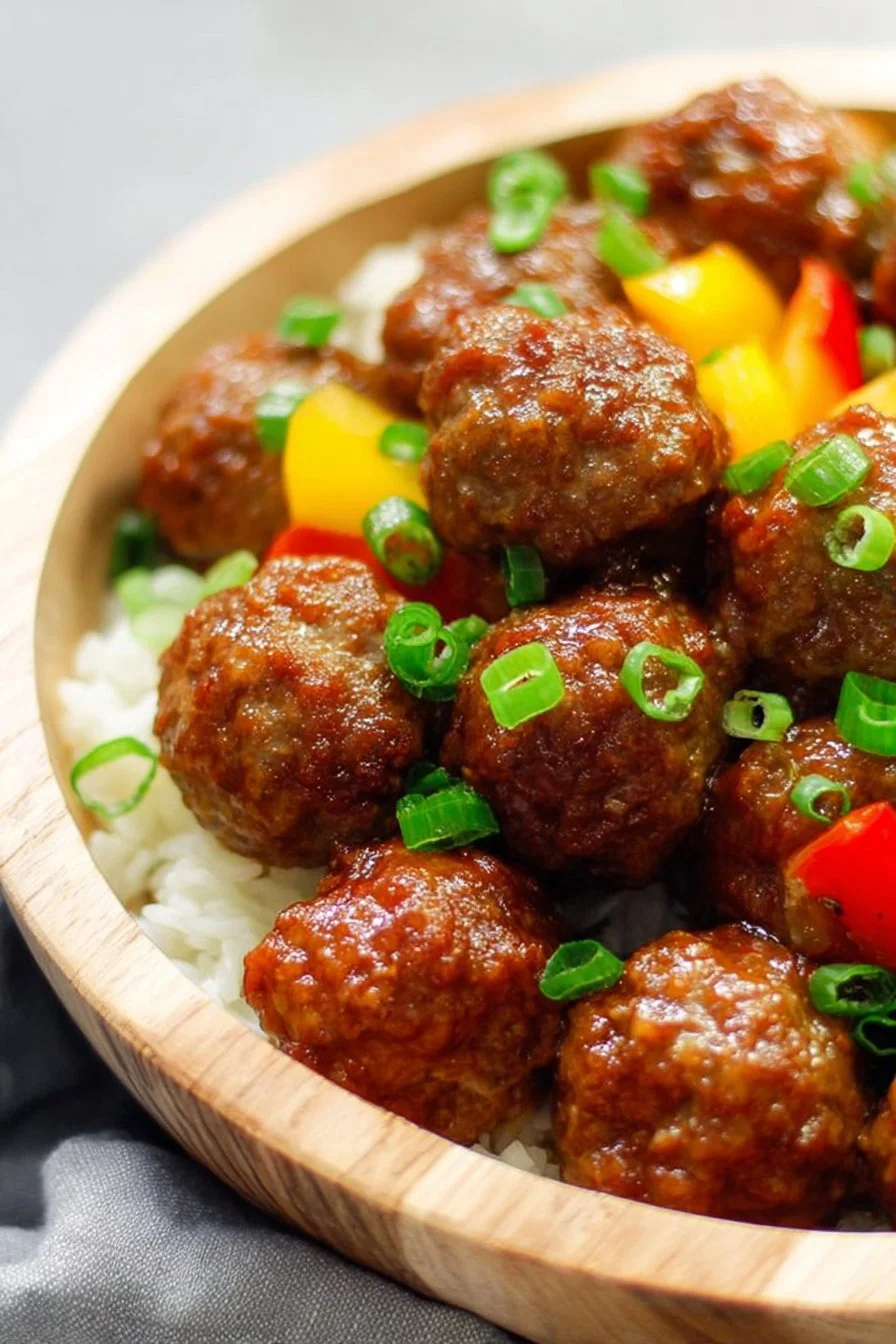 Delicious Hawaiian Meatballs served with pineapple and teriyaki sauce.
