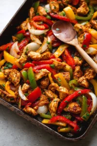 One Pan Fajita Chicken & Veggies served on a plate with vibrant colors