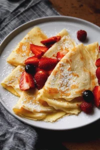 Perfect crepes served with various fillings and toppings on a plate