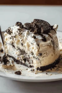 Delicious Cookies and Cream Ice Cream Cake with cookie crumbs topping