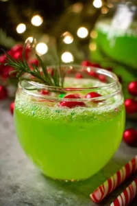 Festive Grinch Punch in a cheerful holiday glass