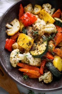 Delicious Parmesan Roasted Vegetables on a serving plate.