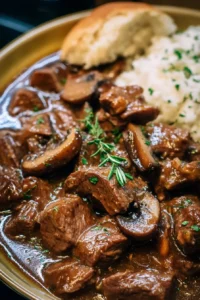 Slow cooker beef tips dish served with vegetables