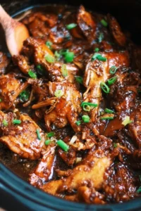 Delicious Slow Cooker Honey Garlic Chicken served with vegetables
