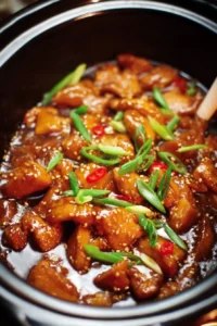 Slow Cooker Mongolian Chicken served with rice and vegetables