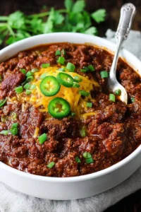 Delicious Texas style chili without beans in a rustic bowl