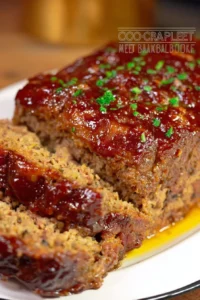 Delicious Copycat Cracker Barrel Meatloaf served with mashed potatoes.