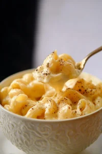 Bowl of homemade Panera Mac and Cheese topped with bread crumbs
