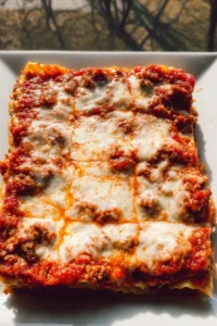 Delicious easy lasagna recipe with layers of pasta and cheese