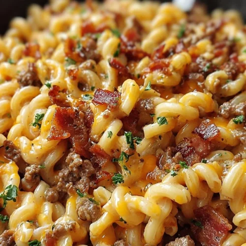 Delicious loaded bacon cheeseburger pasta with cheese, bacon, and pasta
