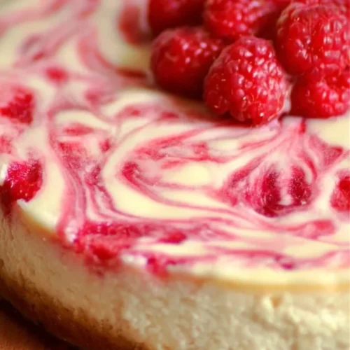 White chocolate raspberry swirl cheesecake 2026 02 21 142925 683x1024