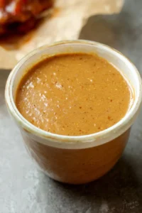 Honey Roasted BBQ Sauce in a bowl with utensils