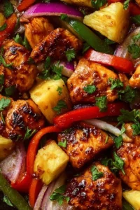 Delicious Hawaiian Chicken Sheet Pan meal with colorful vegetables.
