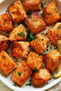 Crispy air fryer salmon bites served with dipping sauce