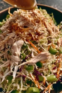Delicious Chinese Chicken Salad topped with fresh vegetables and sesame dressing