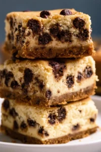 Chocolate chip cheesecake bars with a creamy texture and chocolate chunks