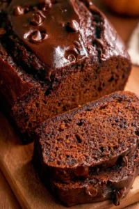 Slices of moist Chocolate Pumpkin Bread with chocolate chips and pumpkin puree