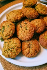 Delicious falafel balls served with fresh vegetables and tahini sauce.