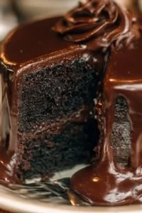 Delicious slice of Famous Brick Street Chocolate Cake with rich chocolate frosting