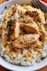 Delicious Garlic Parmesan Chicken served with flavorful rice