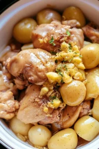 Slow Cooker Garlic Butter Chicken served with creamy potatoes for a hearty dinner