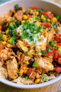 Southwest chicken and rice bowl topped with fresh ingredients and spices