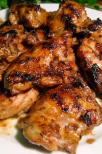 Delicious Thai grilled chicken served with fresh herbs and dipping sauce.