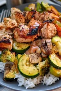 Delicious air fryer hibachi chicken and vegetables served on a plate